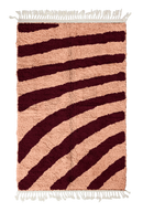 Turning Stride zebra stripe wool rug, oxblood red stripes on blush pink, full view from above with fringed ends