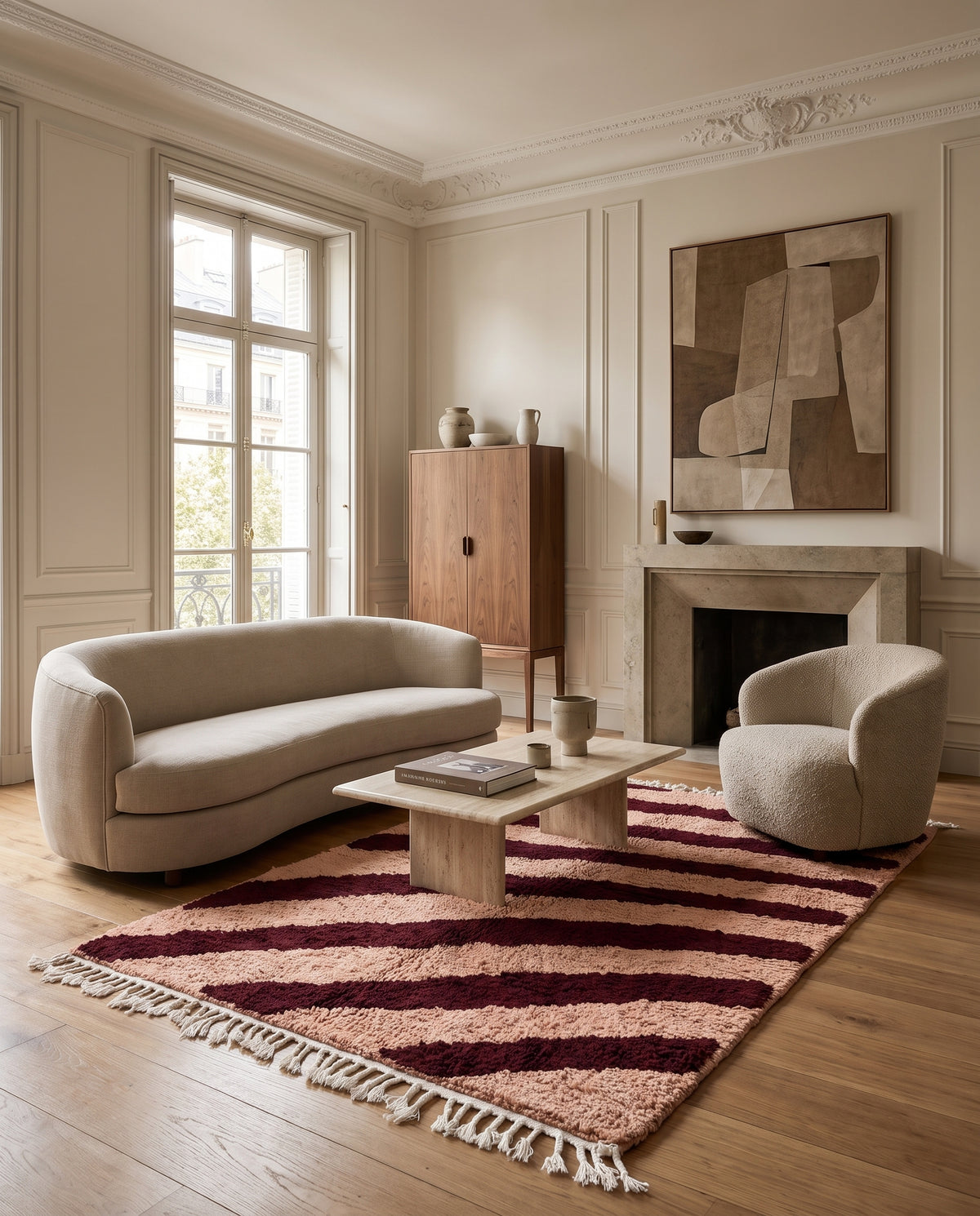 Burgundy and Blush Pink zebra stripe wool rug in a furnished room