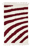 Turning Stride zebra stripe wool rug, burgundy stripes on cream, full view from above with fringed ends