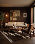 Load image into Gallery viewer, Cream and Dark Brown zebra stripe wool rug in a furnished room
