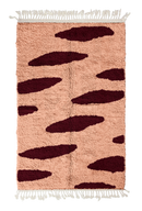 Brush Stride zebra stripe wool rug, oxblood red stripes on blush pink, full view from above with fringed ends