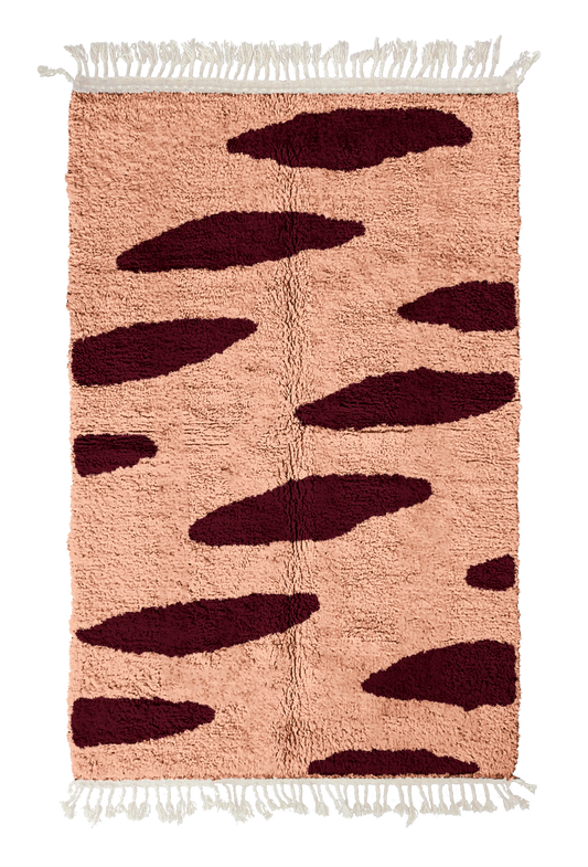 Brush Stride zebra stripe wool rug, oxblood red stripes on blush pink, full view from above with fringed ends