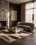 Load image into Gallery viewer, Burgundy and Cream zebra stripe wool rug in a furnished room
