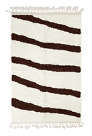 Open Stride zebra stripe wool rug, dark brown stripes on cream, full view from above with fringed ends