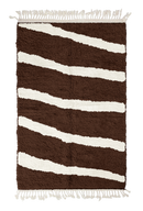 Open Stride zebra stripe wool rug, cream stripes on dark espresso brown, full view from above with fringed ends