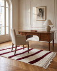Load image into Gallery viewer, Burgundy and Cream zebra stripe wool rug in a furnished room
