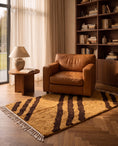 Load image into Gallery viewer, Brown and Ochre Yellow zebra stripe wool rug in a furnished room
