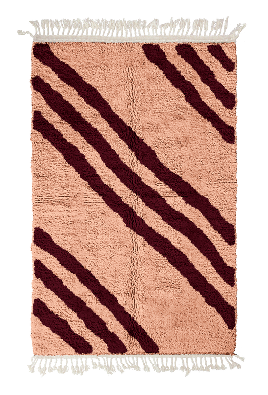 Cluster Stride zebra stripe wool rug, oxblood red stripes on blush pink, full view from above with fringed ends