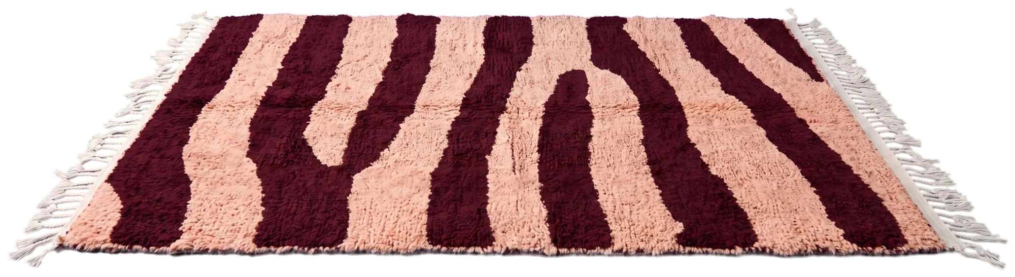 Fork Stride zebra stripe wool rug in oxblood on blush, laid flat